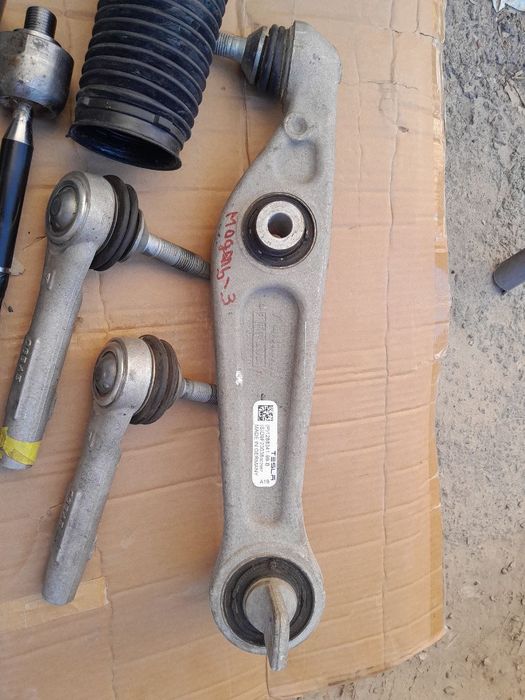 Оригінальні запчастини по рульовій і ходовій на Теслу Модель Y