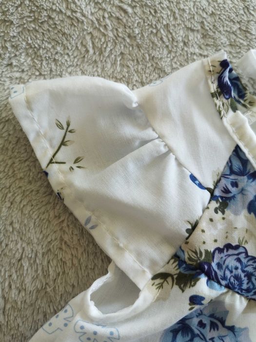 Biała elegancka zwiewna wiązana bluzka w kwiatki 68 - 74 jak nowa