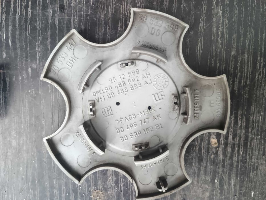 Kołpaczki dekielki felg Opel  110 mm Komplet Oryginał