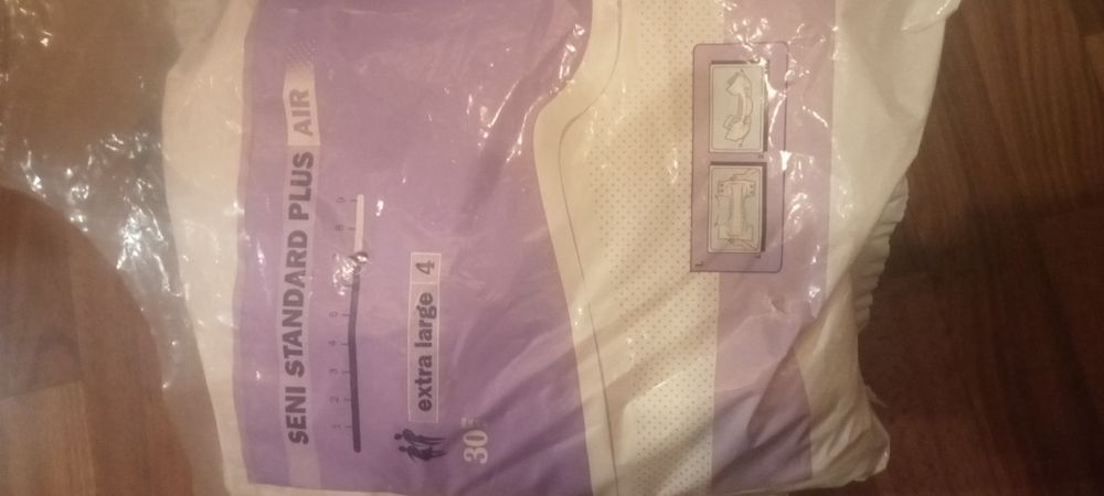 Продам памперси новие .