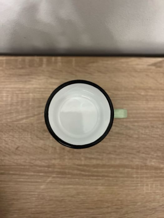 Metalowy kubek z napisem