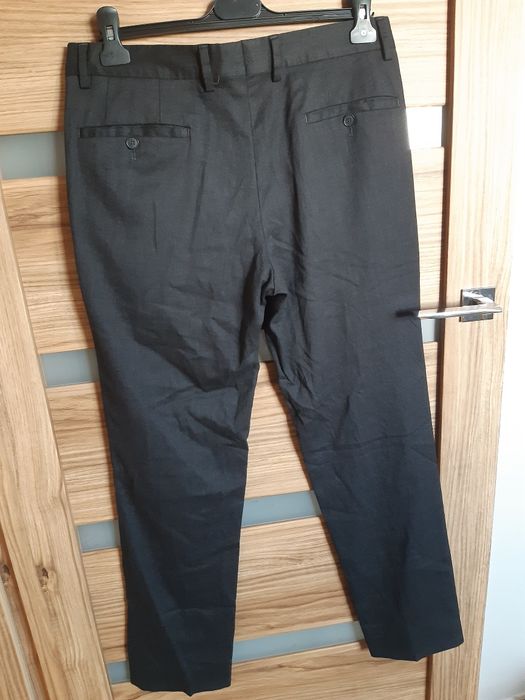 Spodnie eleganckie wełna M L męskie