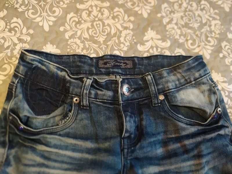 Damskie spodnie jeans 36