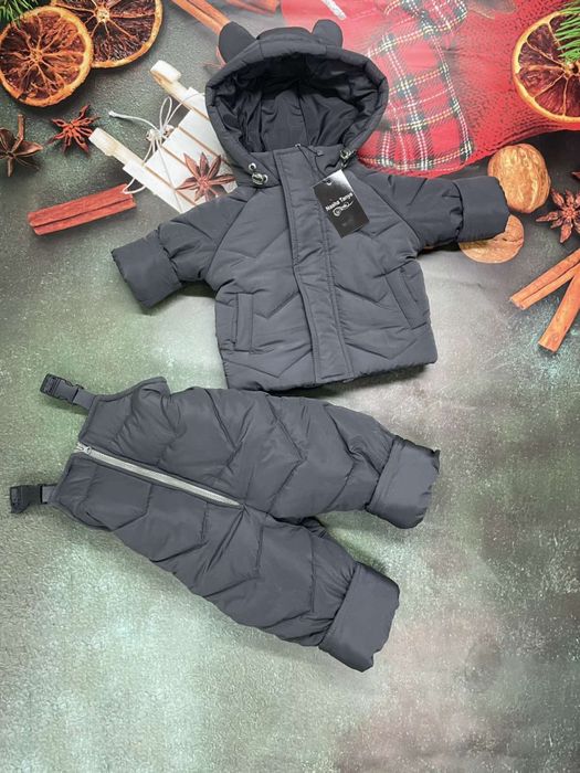 Зимові комбінезони