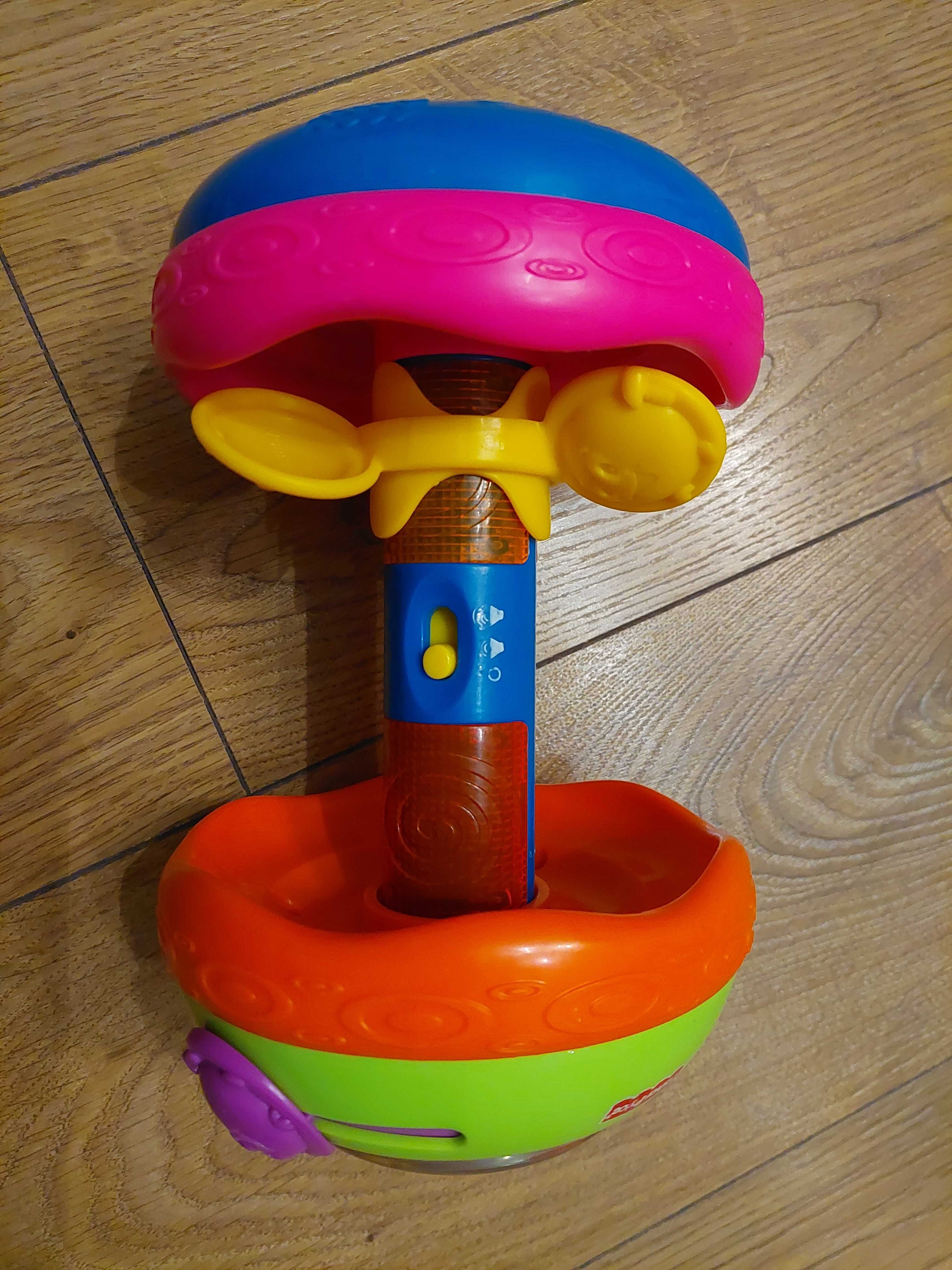Muzyczny walec zabawka dla niemowląt do nauki raczkowania Fisher Price