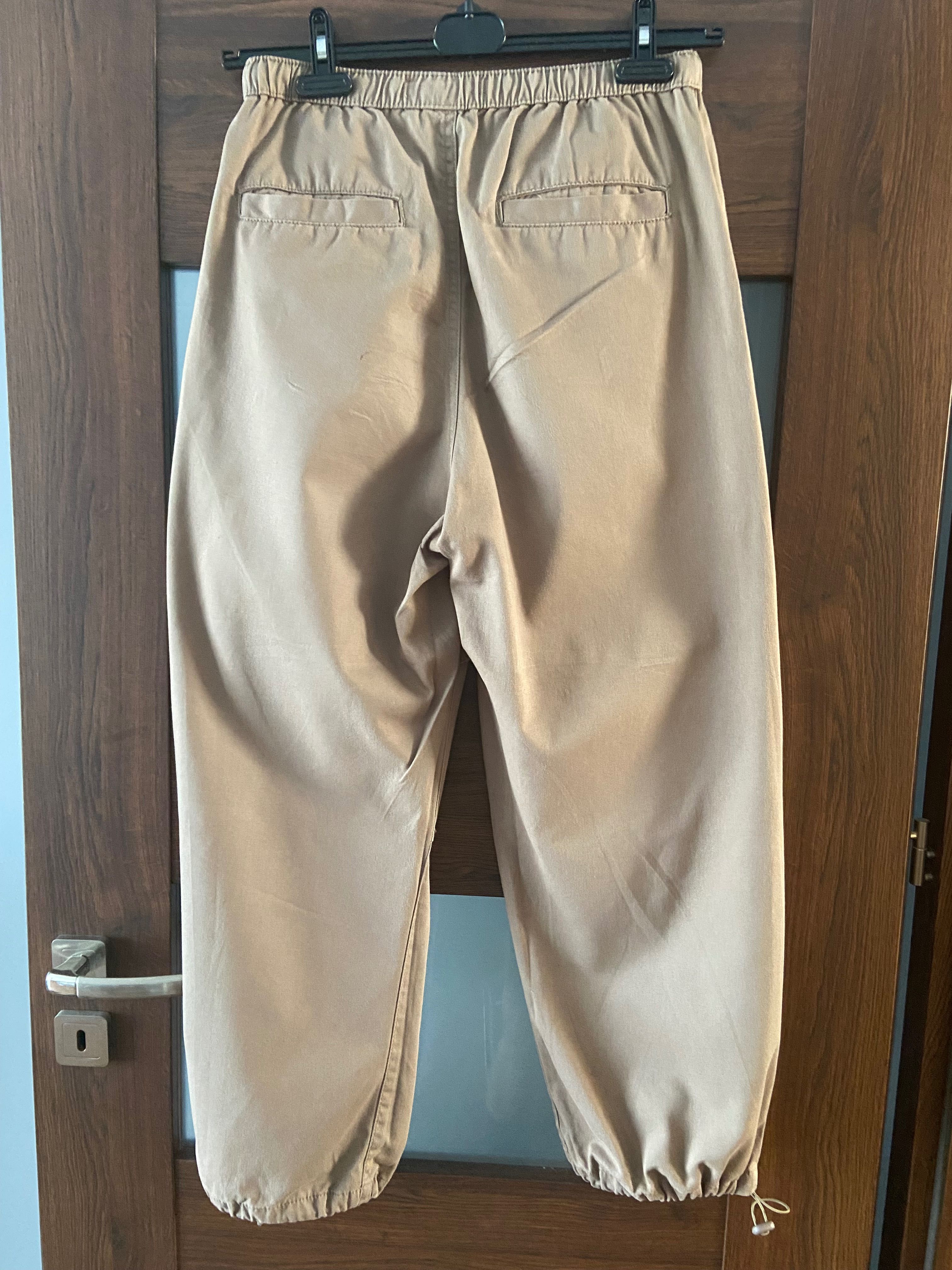 męskie spodnie spadochronowe bershka