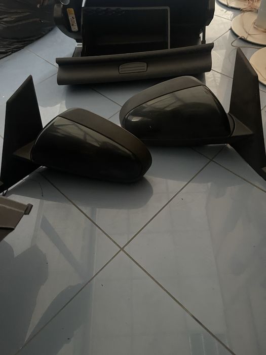 Vendo porta luvas e espelhos dim Mitsubishi originais impecaveis