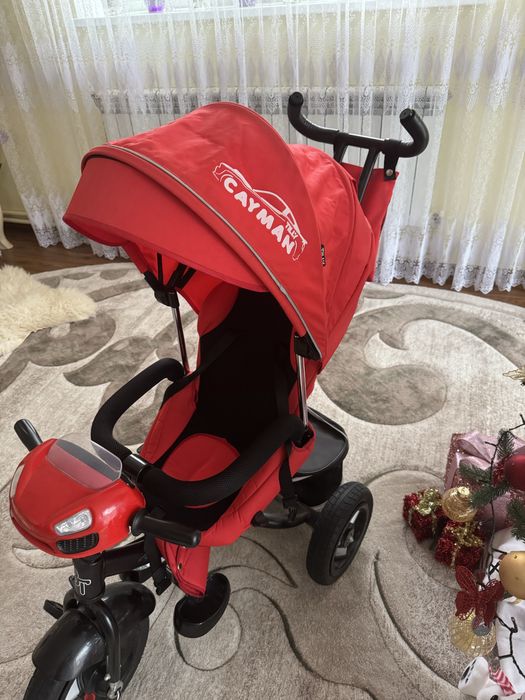 Триколісний велосипед з батьківською ручкою