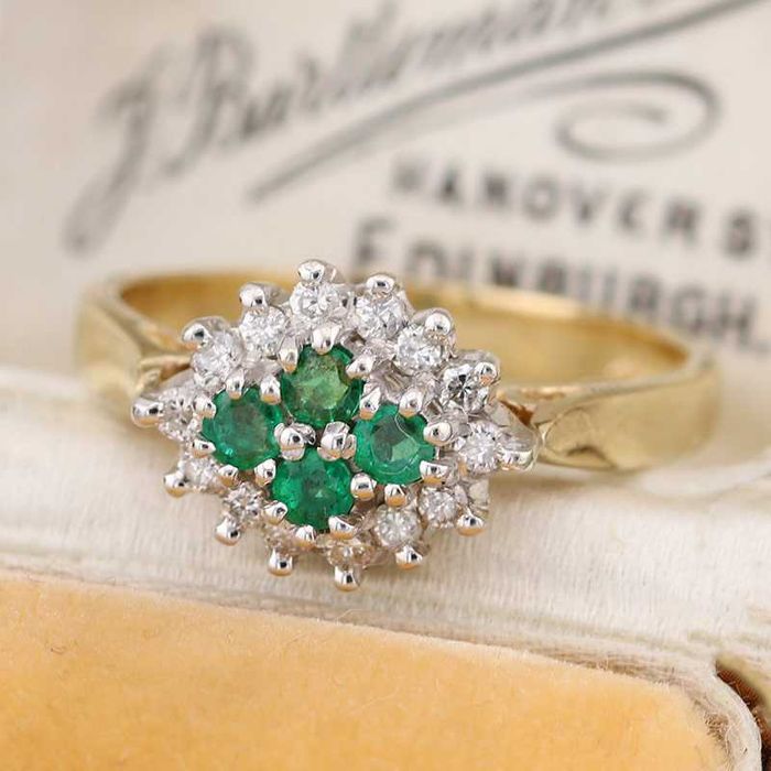 Złoty pierścionek ze szmaragdami i diamentami 0.42ct 9K