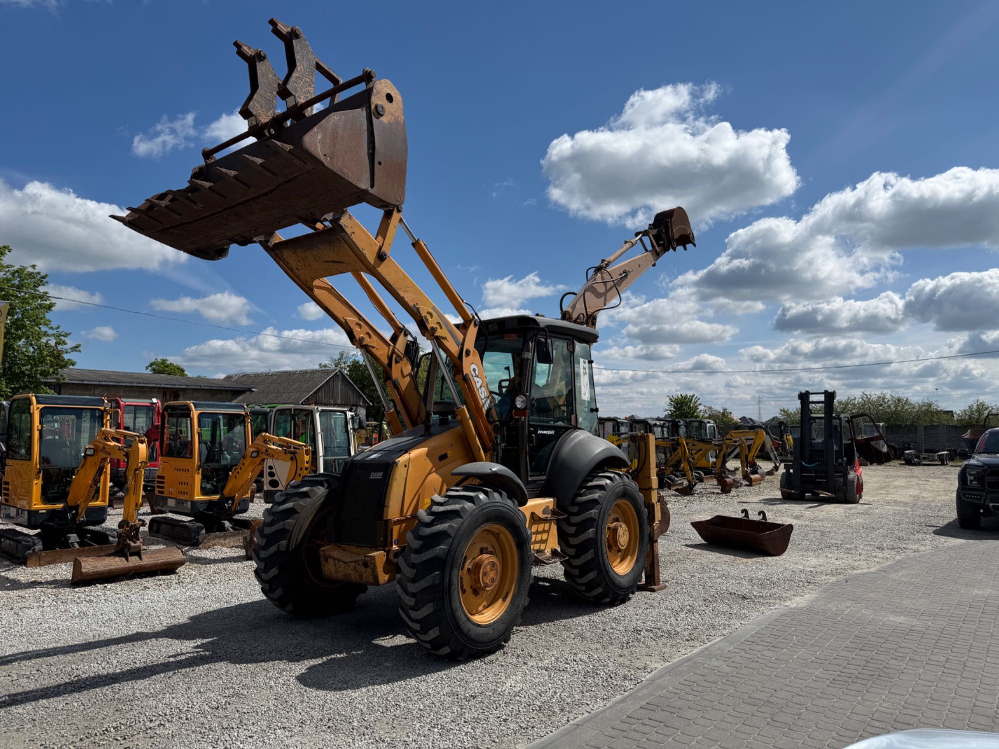 Koparko-Ładowarka Case 695 SM z 2003 rok BRUTTO 3 łyżki 4w1 widły