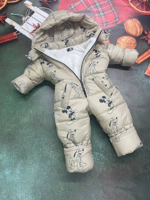 Зимові комбінезони