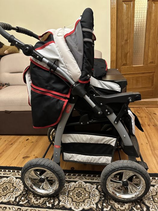 Коляска прогулянкова +люлька + дощовик+ сітка