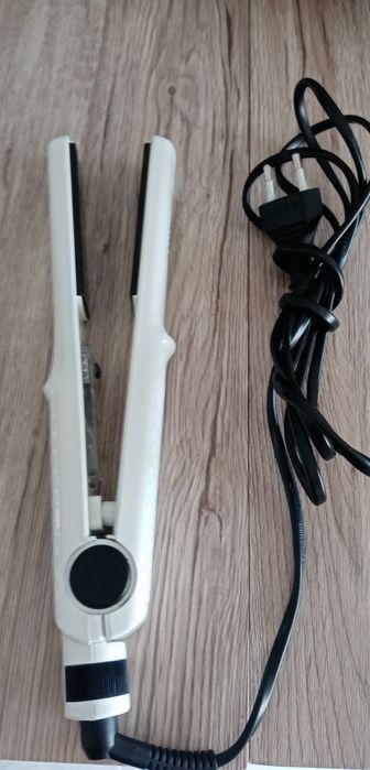 Prancha cabelo como Nova