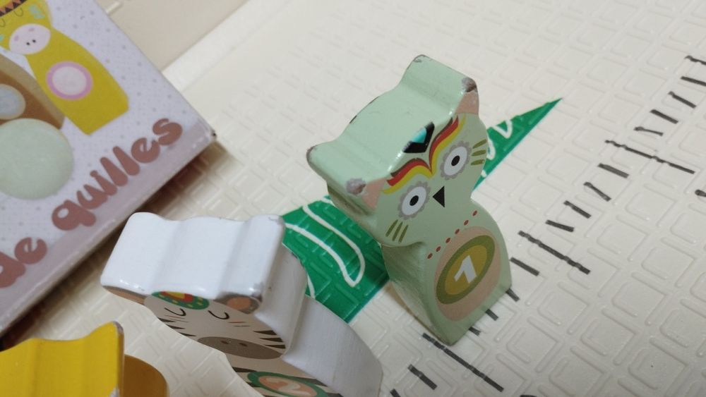 Bowling de animais em madeira