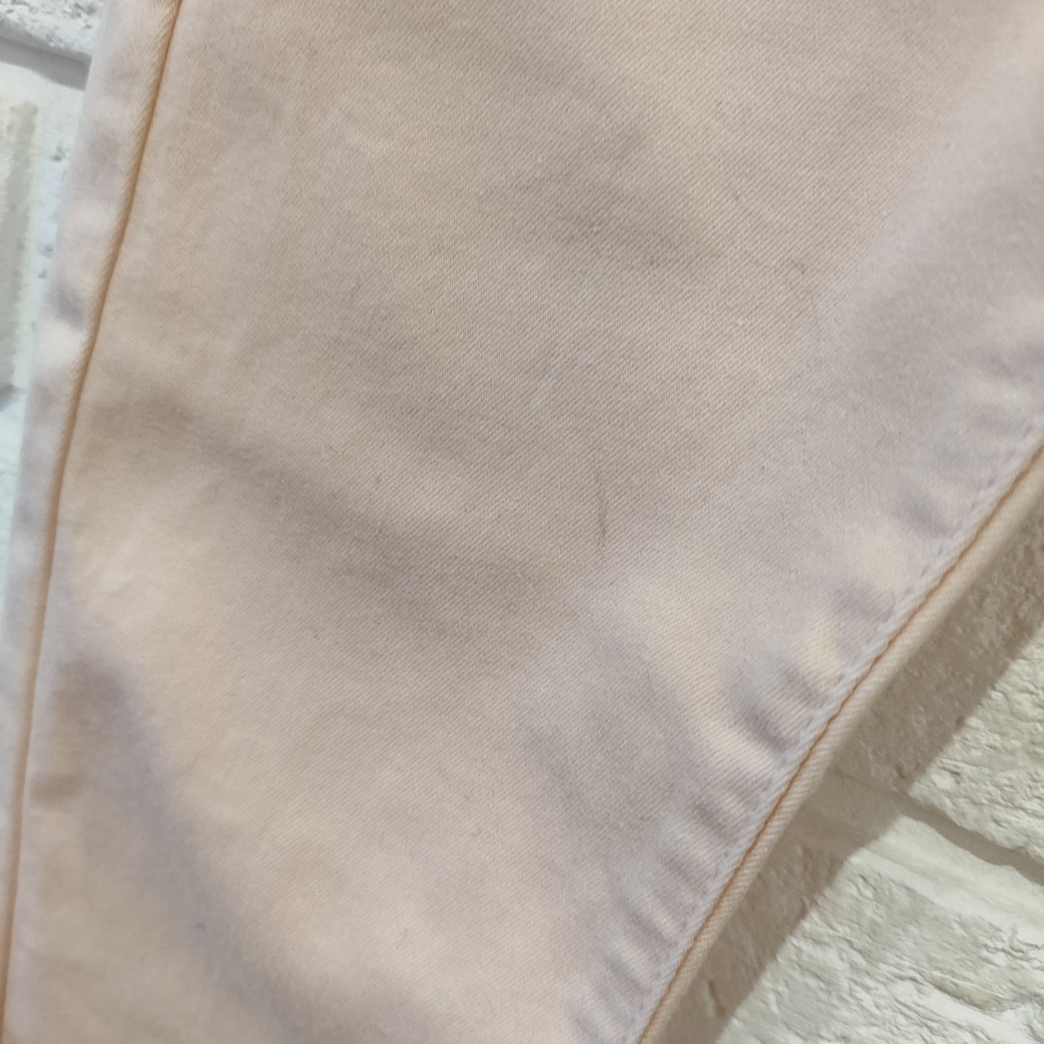 Damskie spodnie rurki pudrowy róż S / M