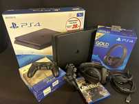 Playstation 4 slim 1TB, 2 comandos, 1 headset wireless gold, 1 jogo