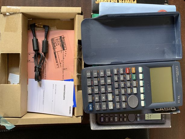 Calculadora Casio FX 1.0 com manual