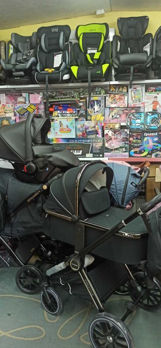 Колеса , бампери , шарніри , механізми для дитячих колясок