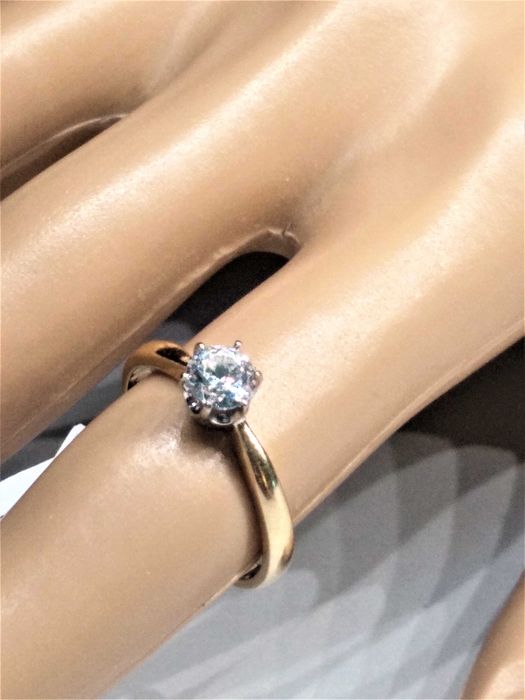 Złoty pierścionek 585 z brylantem 0,53ct (certyfikat )