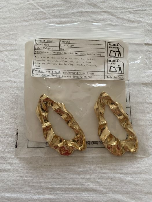 Brincos dourados ovais Shein