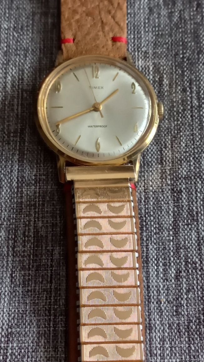 Sprzedam pozłacany męski zegarek Timex na pasku i z bransoletą