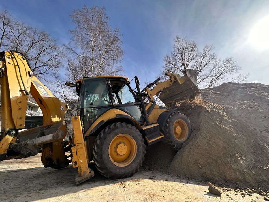 Usługi koparko-ładowarką koparką wynajem koparki roboty ziemne