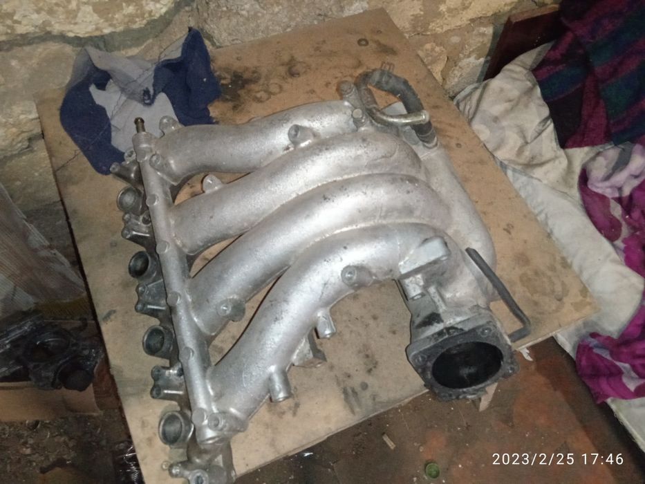 Впускной коллектор Мицубиси каризма 1.8 gdi