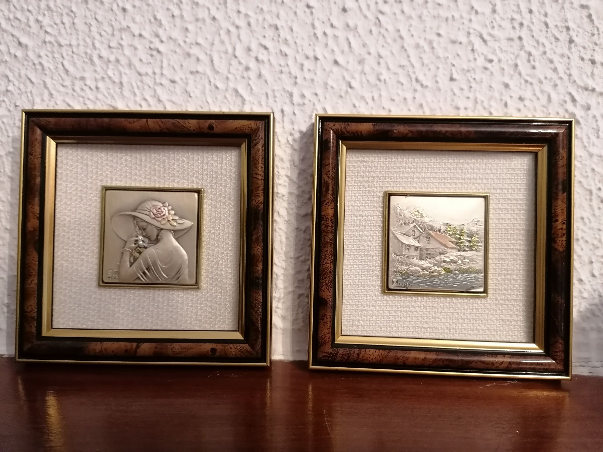 Quadros com criação artística sobre placa de prata