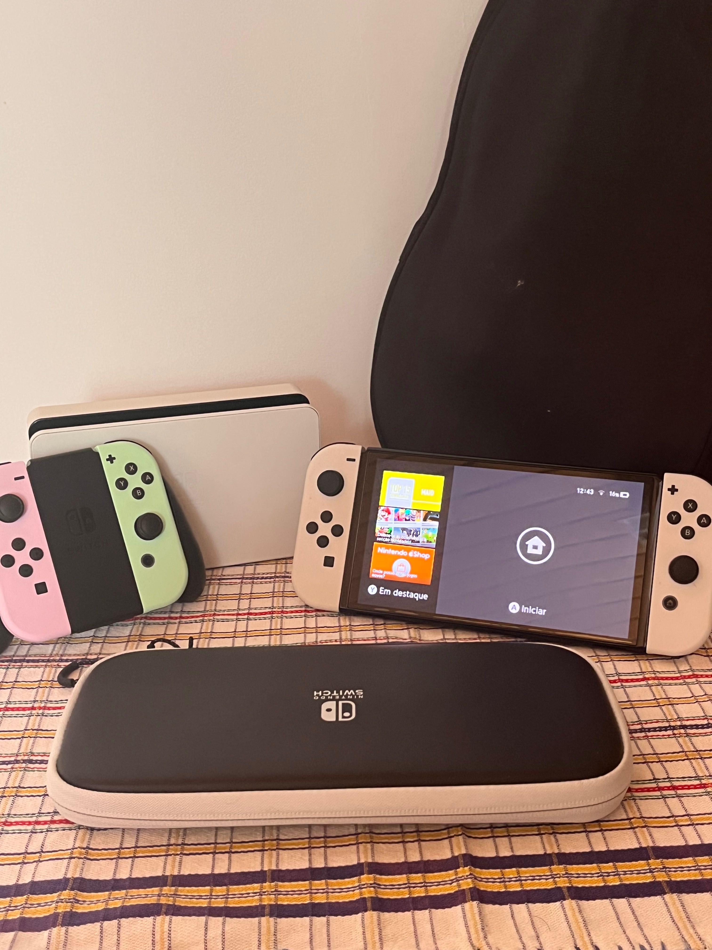 Nintendo Switch OLED + Bolsa + 2 joycons + 3 jogos fisicos