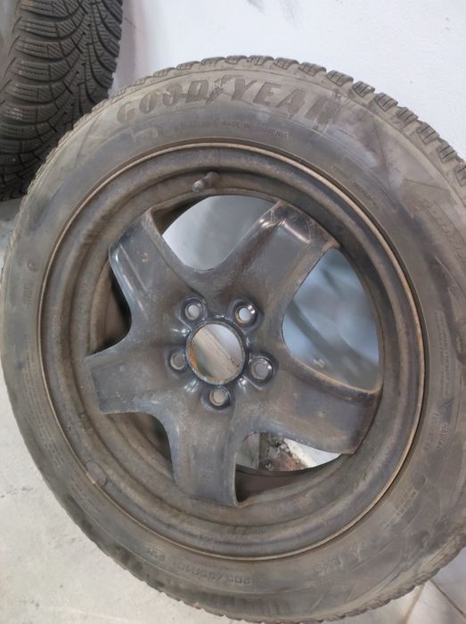 Felgi stalowe strukturalne Opel opony Goodyear Ultragrip 9 zimowe