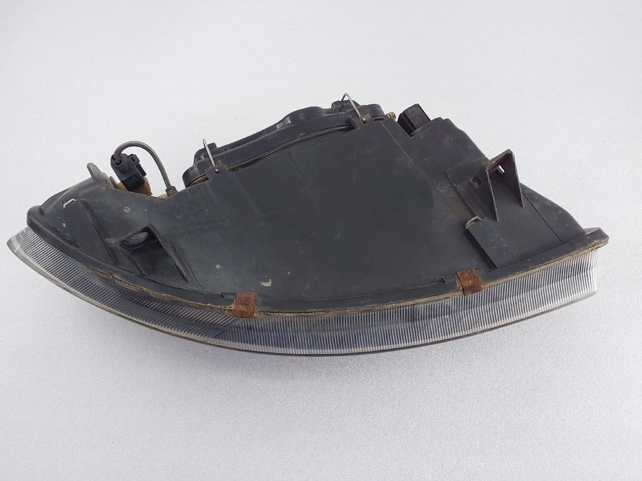 Ótica / farol esquerda SEAT Leon (1M1)