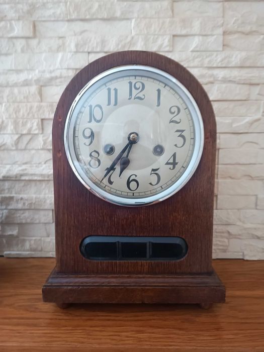 Kominkowy zegar Baba