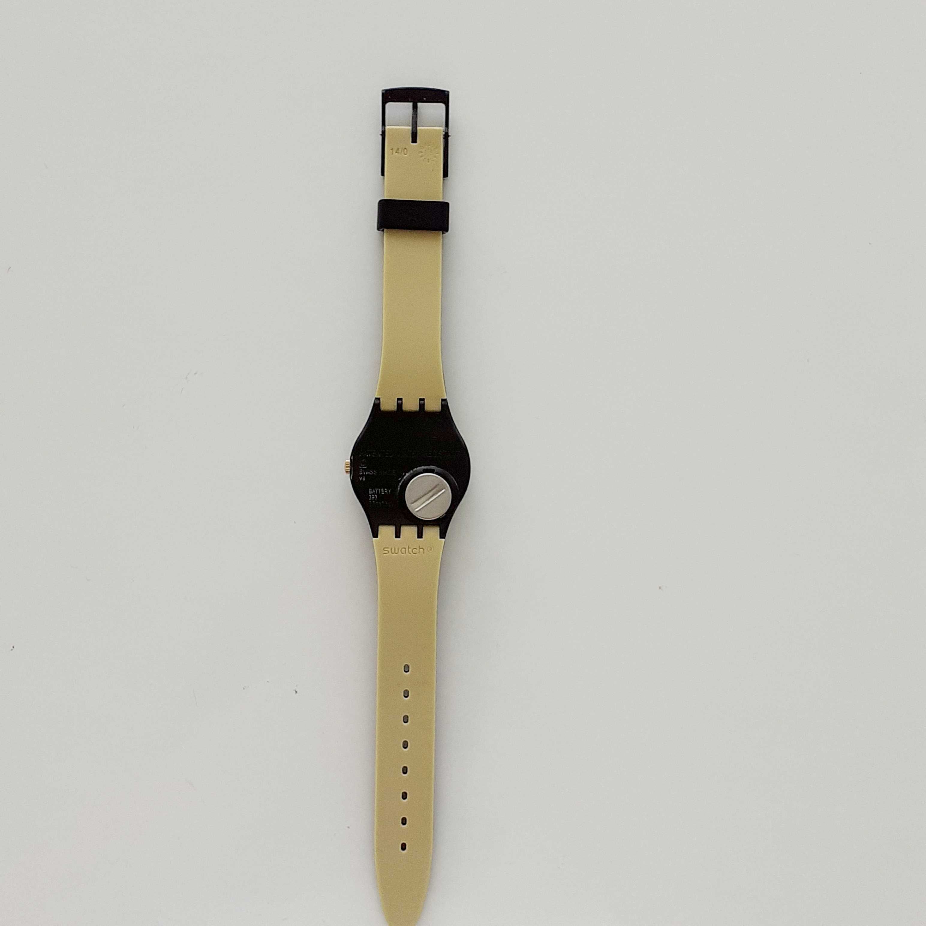 Zegarek Swatch ze złotym cyferblatem