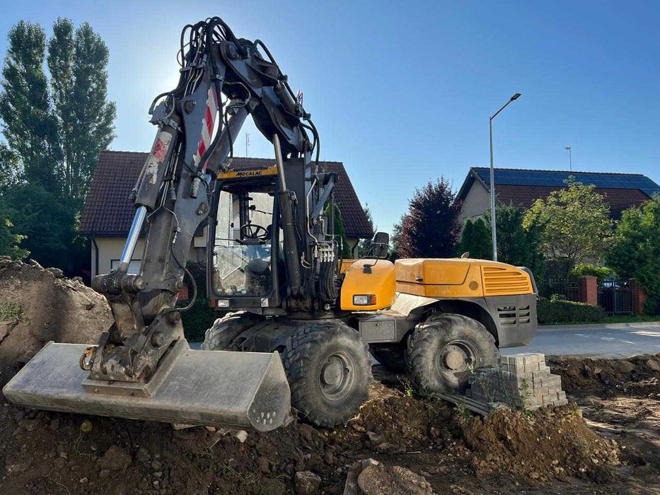 Wynajem koparko-ładowarki Mecalac z operatorem