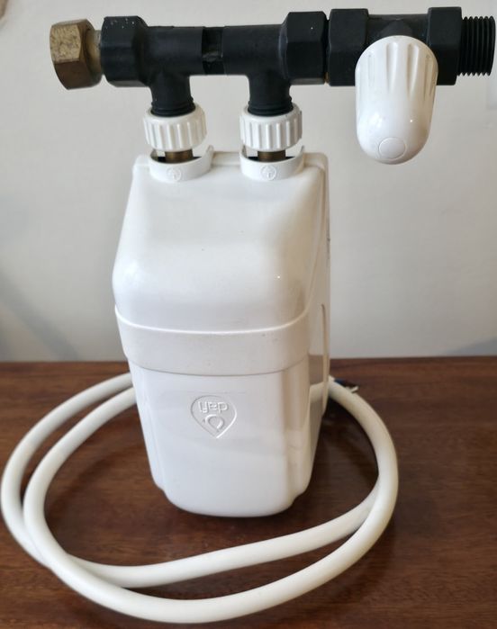 Проточний  електричний  водонагрівач  DAFI