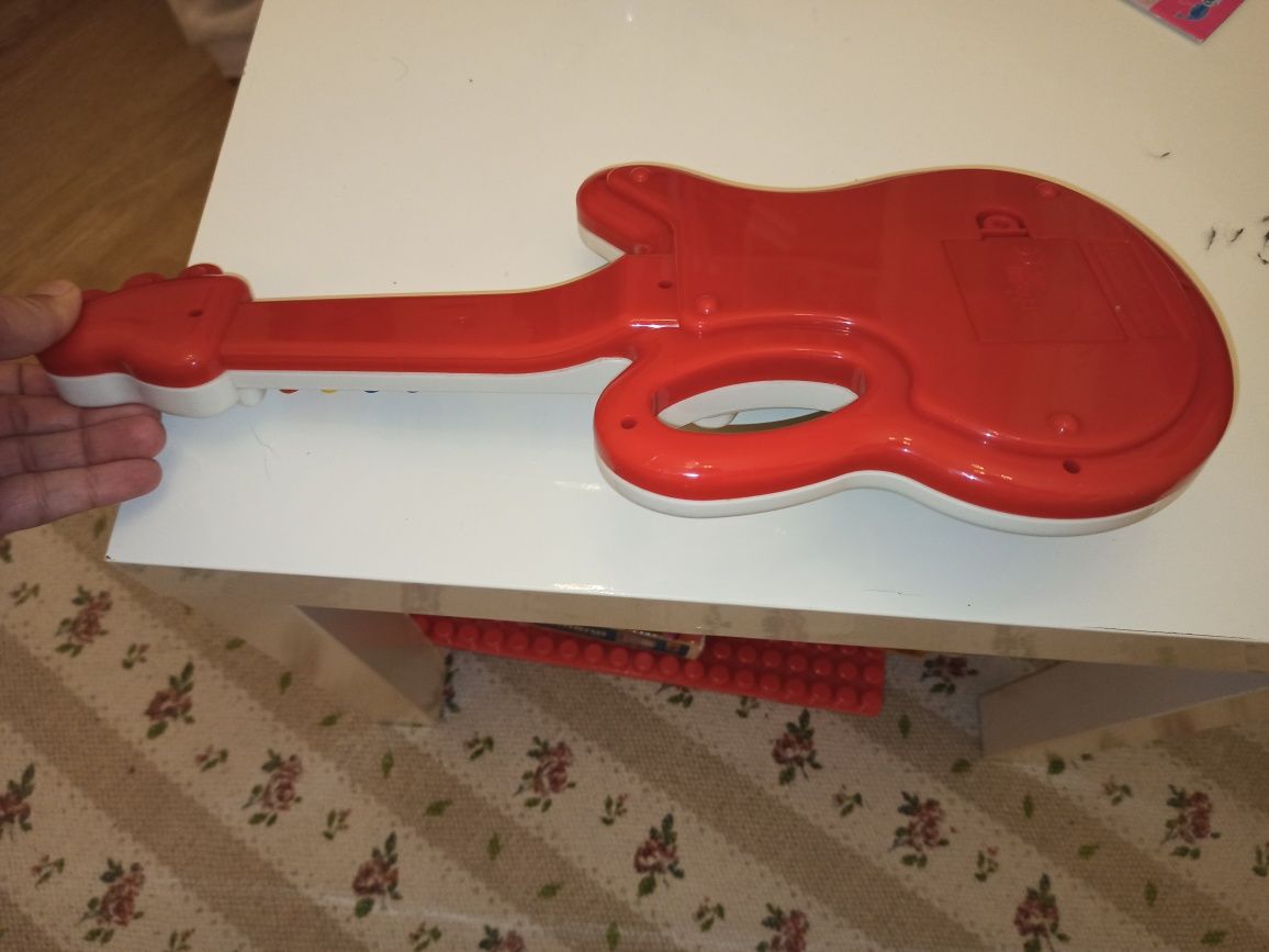 Instrumento musical chicco guitarra com luzes