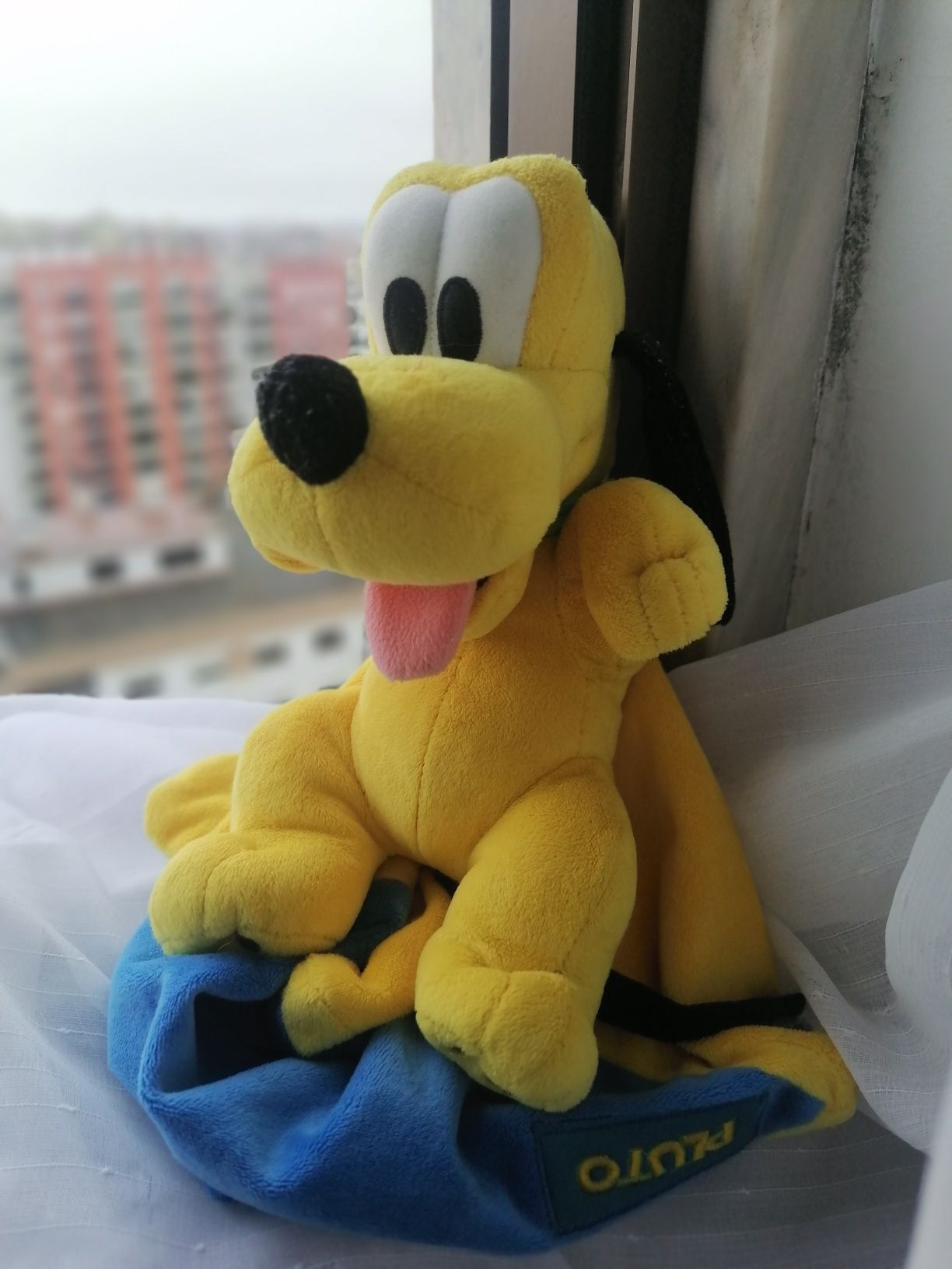 Peluche de criança pluto