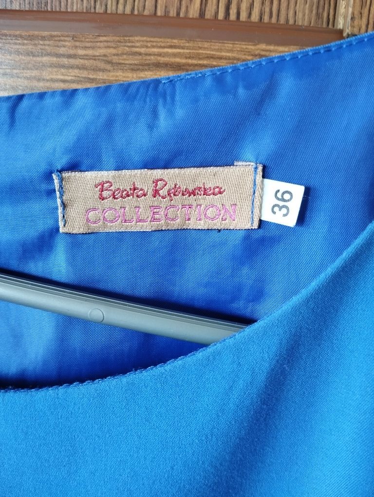 Sukienka niebieska do kolan, rozkloszowana 36