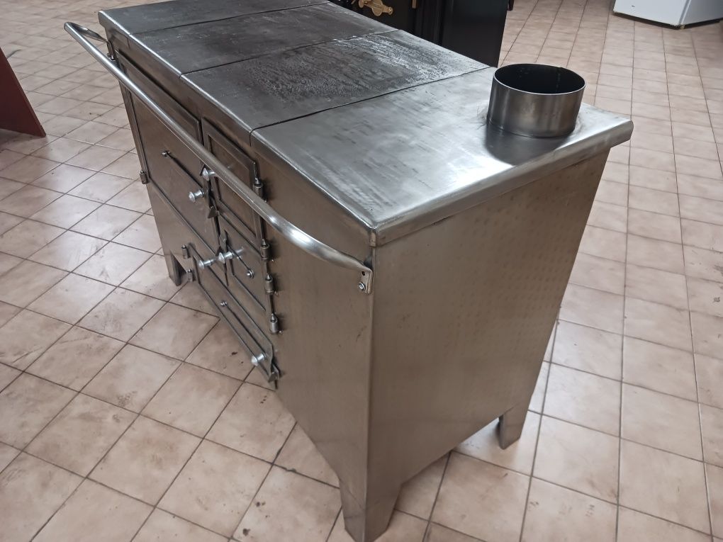 Vendo fogao em ferro inox com serpentina para aquecimento central em ó