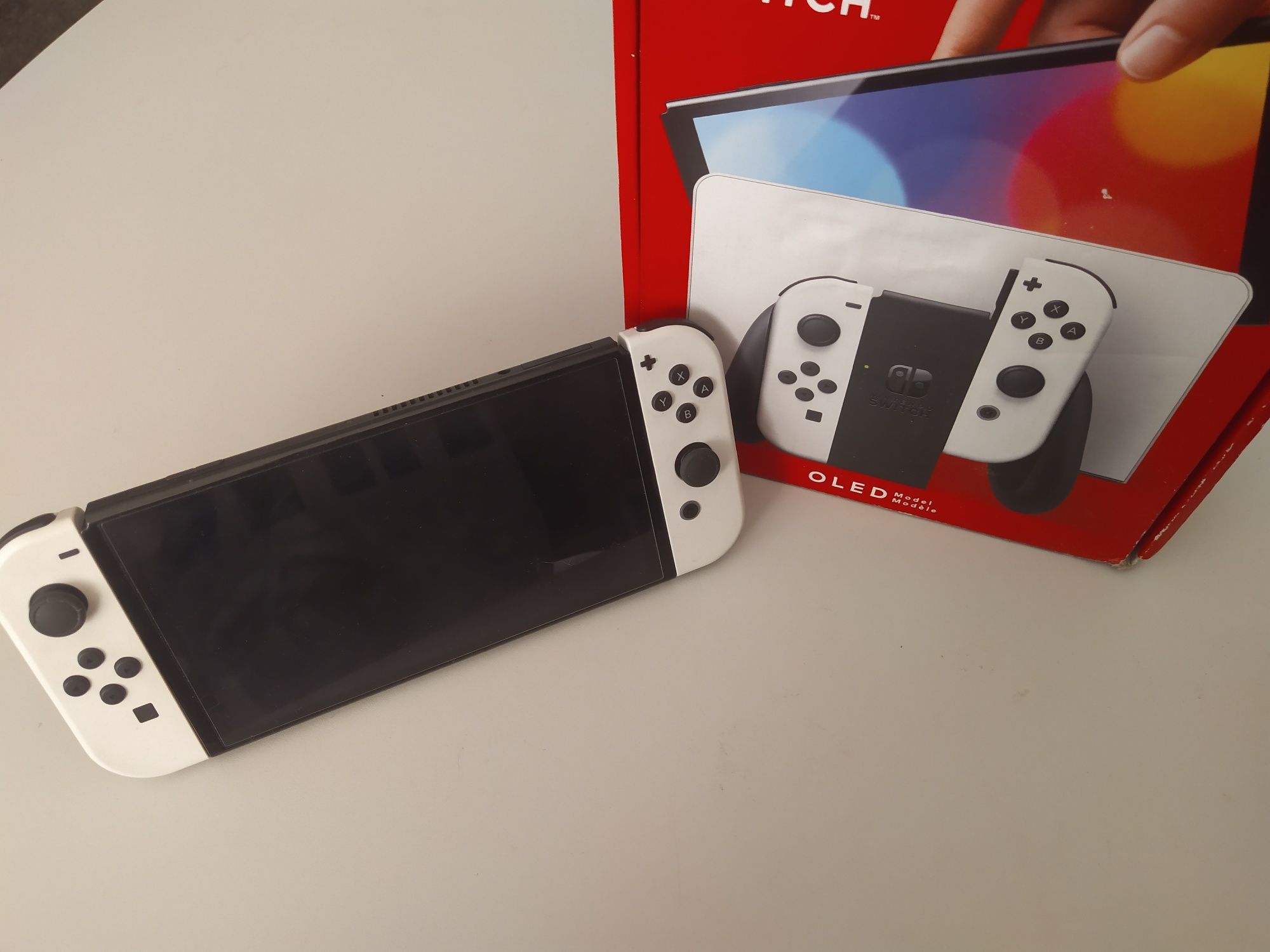 Nintendo Switch OLED + 2 гри + захисне скло