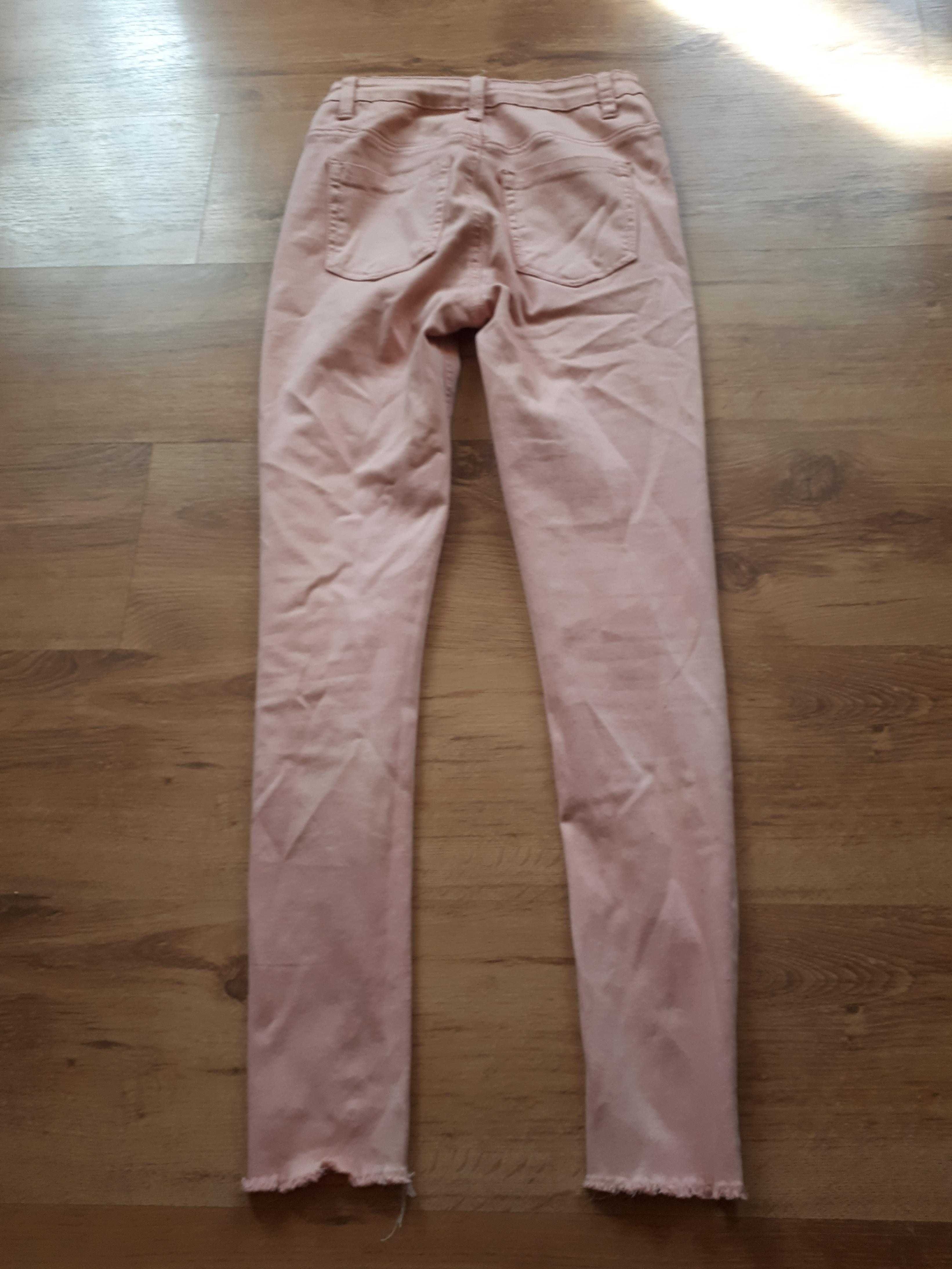 Jeansowe spodnie pudrowy róż Moodo