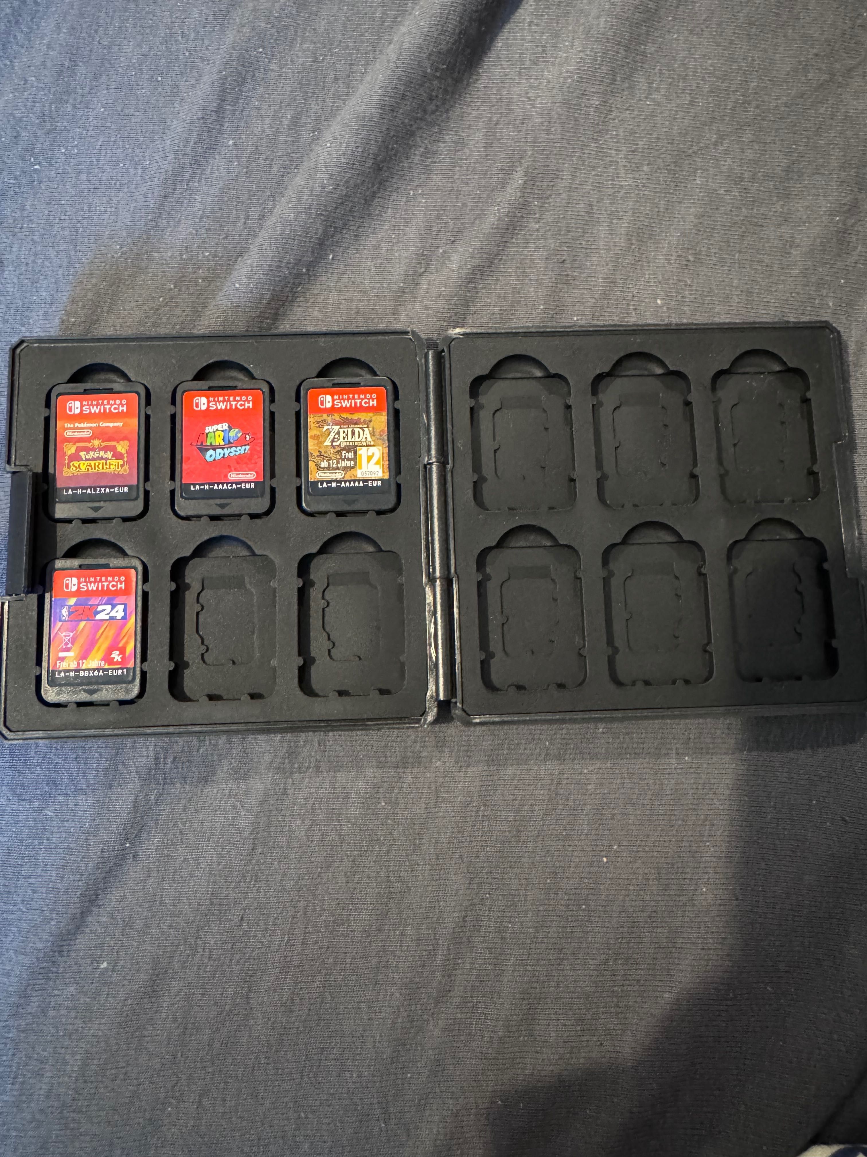 nintendo switch v2 with games and accessories