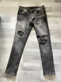 Spodnie męskie dżinsy z dziurami rozdarciami Reserved 31 S M