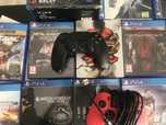 26 jogos ps4 e 2 comandos ps4( consola nao incluida)