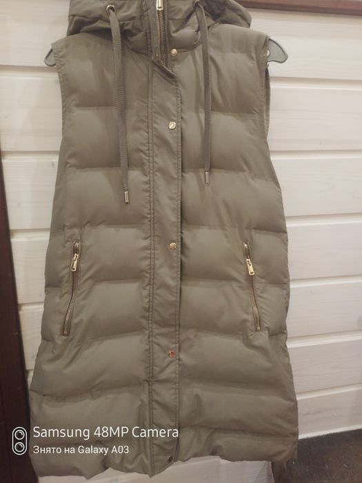 Жилетка, безрукавка жіноча