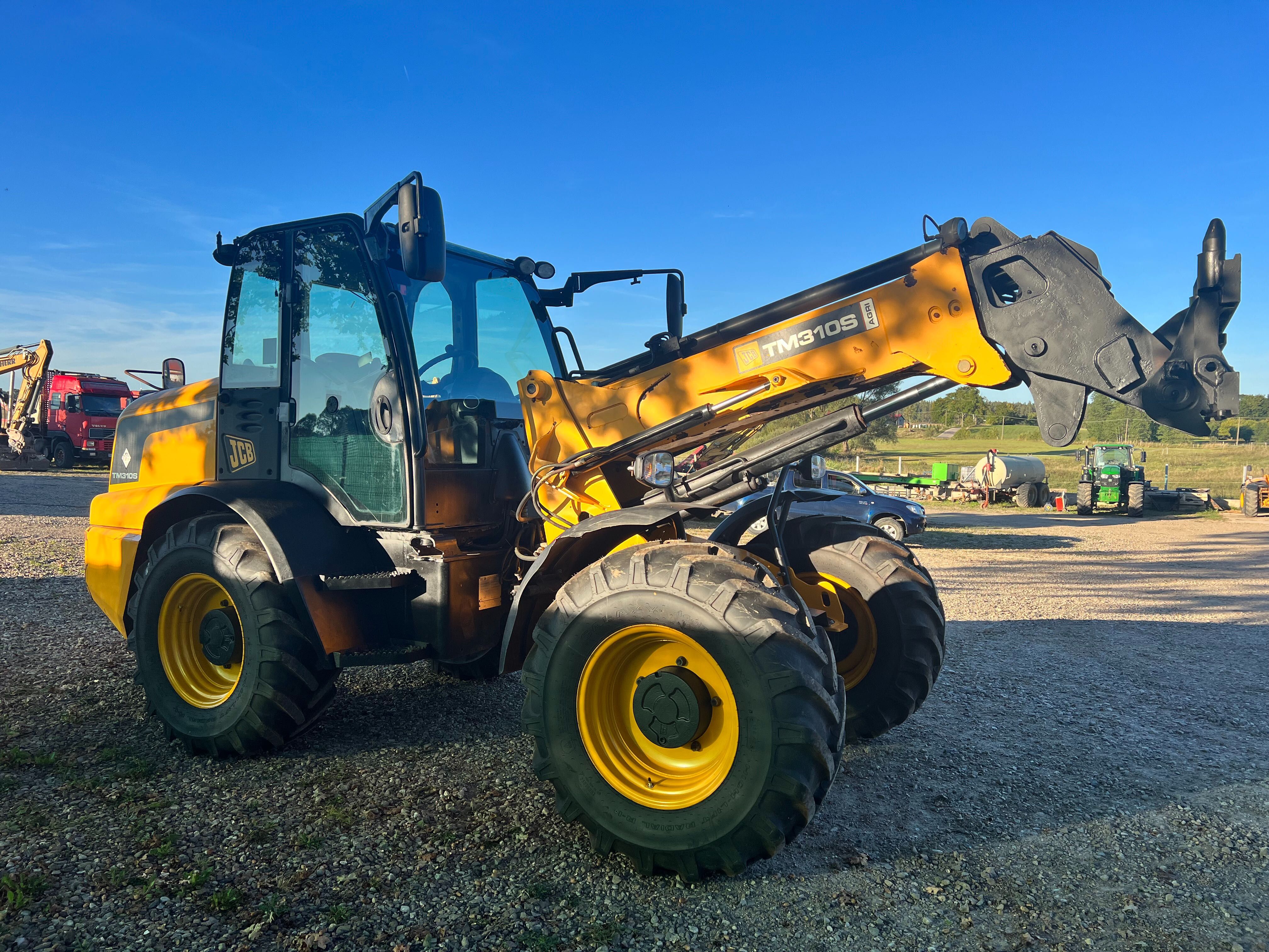 Ładowarka teleskopowa przegubowa Jcb TM 310S tm310s Agri