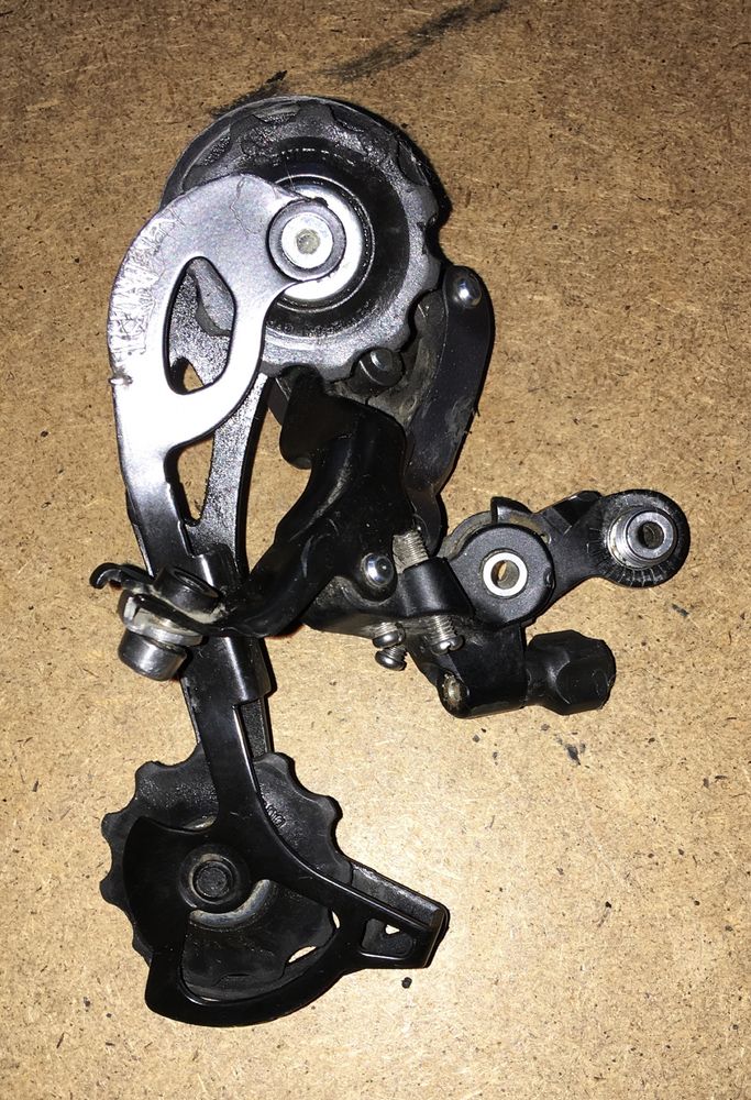 SHIMANO RD-M3100  Przerzutka tylna Shimano Alivio SGS (długi) 9 rz.