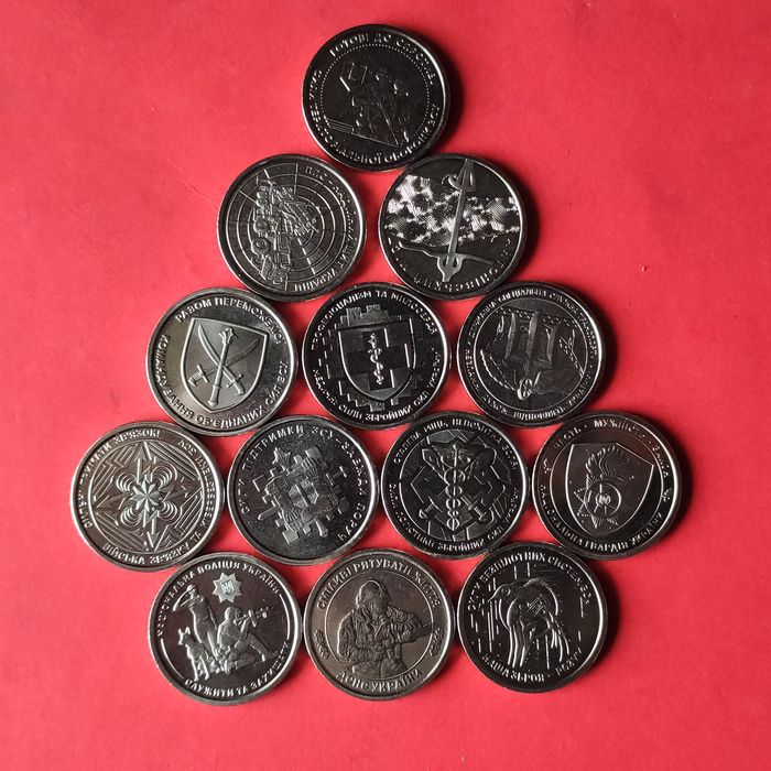 Памятні монети по 10 гривен в ролах і по штучно
