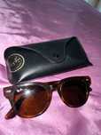 Óculos de Sol Ray-Ban pretos e castanhos