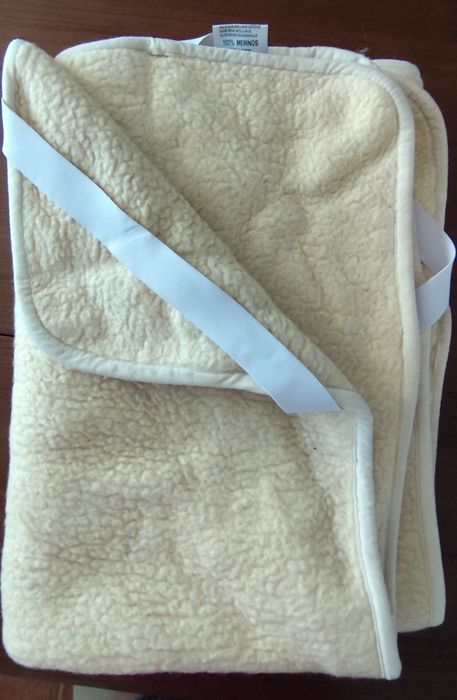 Resguardo para cama de lã de ovelha
